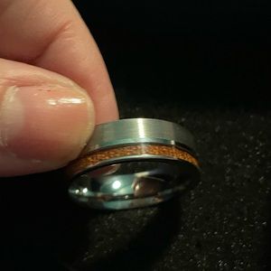 Stainless steel wedding band w/Aztec design. Brand new!!